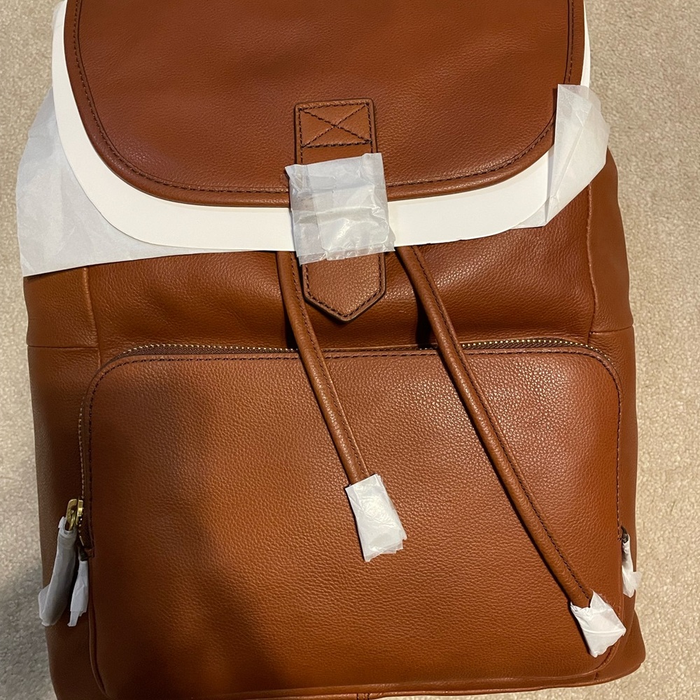 Fossil brand new leather backpack/purse.